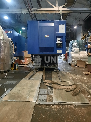 Выгрузка и установка термопластавтоматов